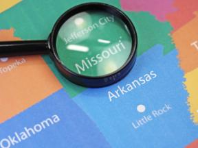 Magnifying glass over Missouri on a map